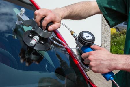 Repairing a windshield. 